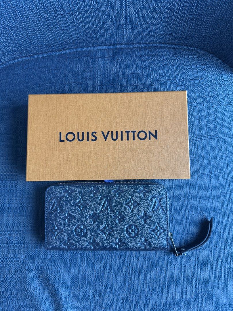 LV empreinte zippy in navy (Category: Luxury Bags & Wallets) located in Subic. Submitted by grabmywardrobe (Listing ID 1451932998, Image 2). Description: NEVER USED / LIKE NEW complete with box dust bag slight negotiable .
