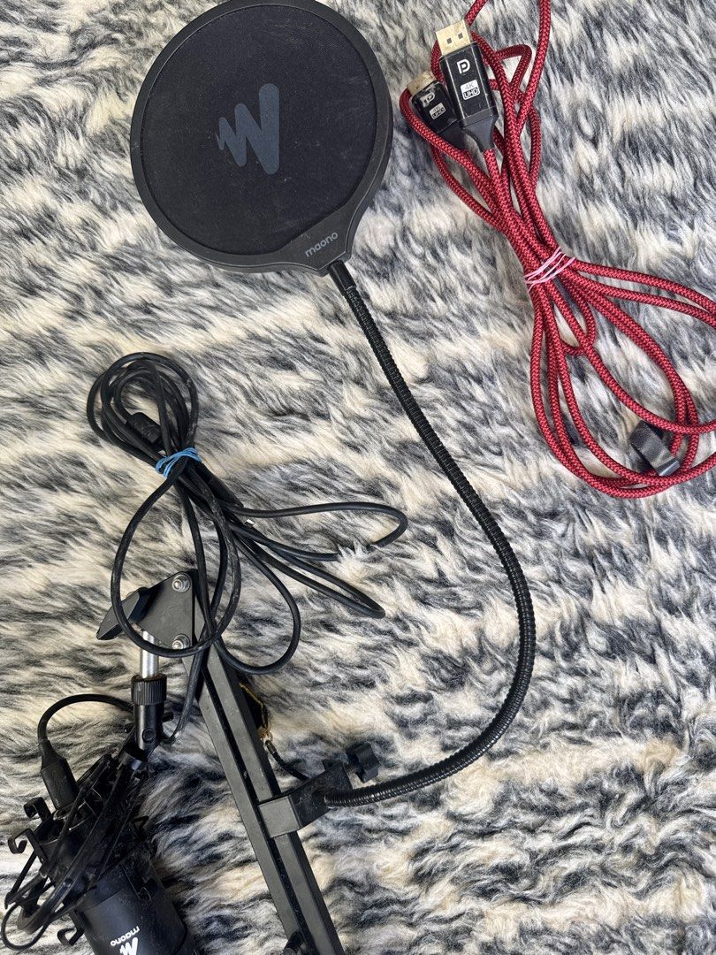Maono Condenser Microphone with Pop Filter and Boom Arm (Category: Microphones) located in Cainta. Submitted by danica010314 (Listing ID 1452034741, Image 1). Description: - Maono condenser microphone - Includes pop filter - Comes with adjustable boom arm - Red USB cable included - Ideal for recording and streaming - Plug-and-play setup.