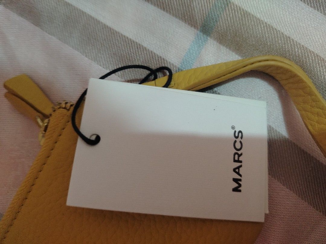 Marcs Long Wallet (Category: Wallets & Card holders) located in Abucay. Submitted by zai_1313 (Listing ID 1452082914, Image 3). Description: - Marcs Atlas Leather Zip Wallet/Wristlet -Brandnew -Mustard Yellow.