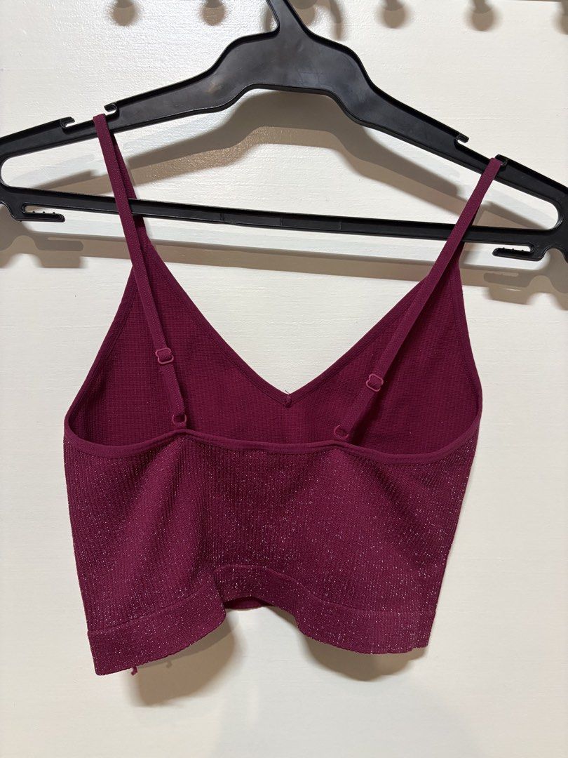 Maroon Sparkly V-Neck Crop Top (Category: Sleeveless) located in Taguig. Submitted by cftbncs (Listing ID 1452041254, Image 3). Description: - Cute maroon crop top - Sparkly shimmer detail - V-neck design - Thin, adjustable straps - Ribbed texture all over - Perfect for pairing with high-waisted bottoms - Ideal for night outs or casual wear.