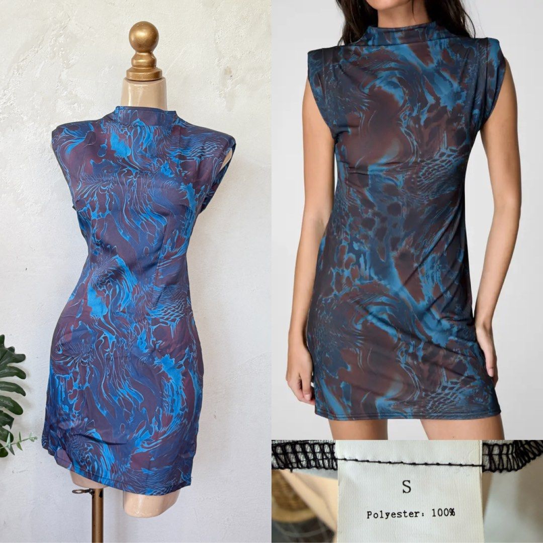Mesh Print Mini Dress (Category: Dresses) located in Santa Rosa. Submitted by martess (Listing ID 1451977664, Image 1). Description: - Sleeveless mesh mini dress - Eye-catching abstract print - High neckline - Stretchy material for comfort - Versatile: great layered or worn alone - Perfect for nights out or a bold casual look - Material: 100% Polyester.
