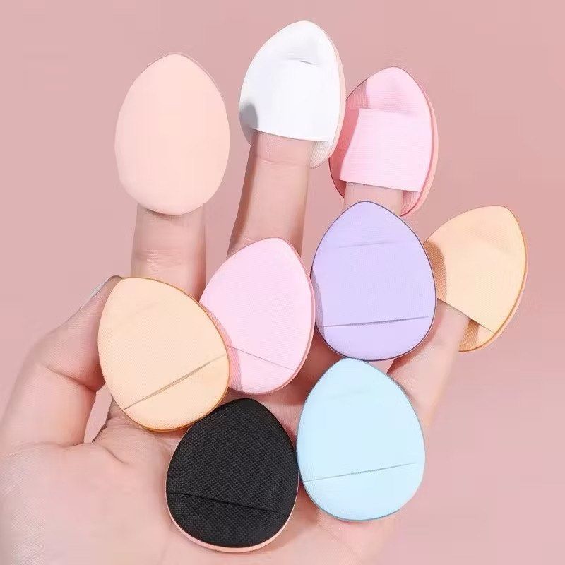 Mini Fingertip Powder Puffs for Flawless Base Makeup (Category: Makeup) located in Quezon City. Submitted by paosells (Listing ID 1451951004, Image 3). Description: - Perfect for precise makeup application. - Pointed tip ideal for nose and eye areas. - Wide base quickly covers blemishes and redness. - Hydrophilic material absorbs minimal powder. - Soft, non-deforming sponge air cushion. - PU leather layer helps keep it clean. - Available in: Whit