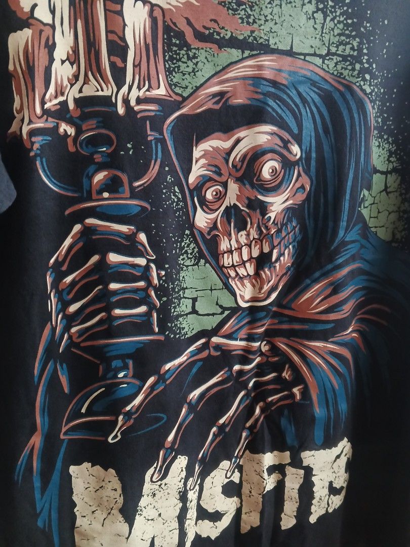 Misfits American Psycho T-Shirt Large (Category: Tshirts & Polo Shirts ) located in Quezon City. Submitted by wheelsonmeals (Listing ID 1451920262, Image 3). Description: - Misfits T-Shirt - American Psycho graphic on front (skull with candelabra) - Small coffin graphic with Misfits logo on back - Tagged size L - Brand: New Type System.