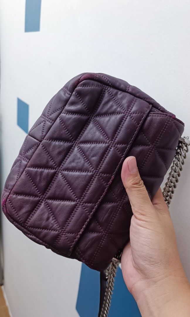 MK Sling bag original (Category: Luxury Bags & Wallets) located in Cavite. Submitted by premfinds (Listing ID 1451905782, Image 2). Description: original MK with rubs sa edge but retouched already overall good condition.