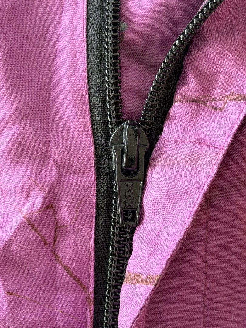 Mossy Oak Pink Camo Cargo Shorts Size M (Category: Shorts) located in Bauang. Submitted by paringaoseven (Listing ID 1452070970, Image 3). Description: Mossy Oak Purple Camo Cargo Shorts Materials: 100% Polyester Dimensions Waist: 26 Length. 15 - Style: Pink Camo Cargo Shorts - Size: Medium (M) - Material: 100% Polyester - Features: Multiple pockets with button closures, black quilted side panels, adjustable drawstring details - Zipper: YKK .