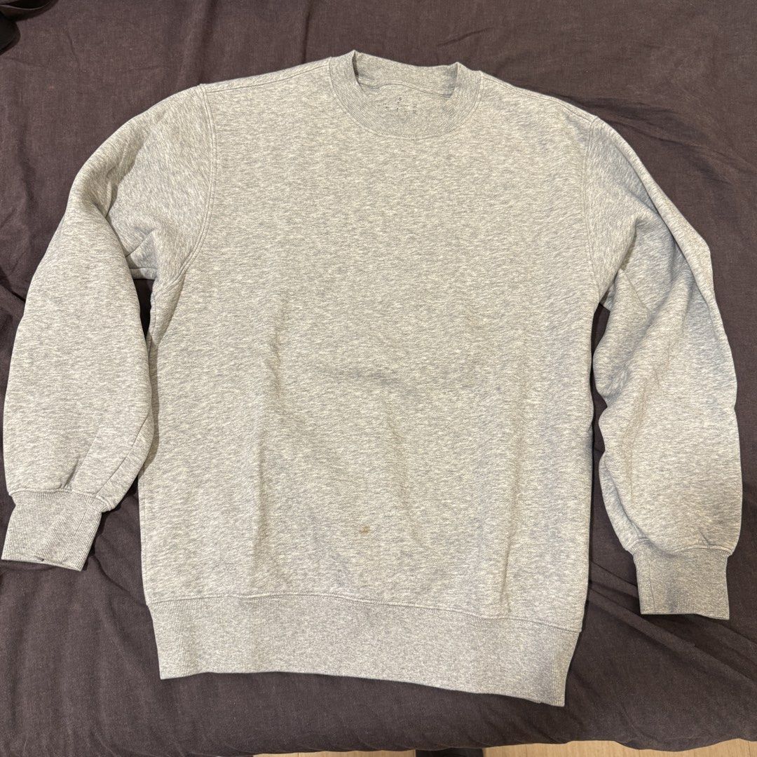 Muji Grey Crewneck Sweatshirt (Category: Coats, Jackets and Outerwear) located in Manila. Submitted by jpumpa (Listing ID 1452048946, Image 1). Description: - Classic grey crewneck sweatshirt - Long sleeves with ribbed cuffs and hem - Ideal for casual, everyday styling - Small marks on the front, clearly shown in close-up photo.