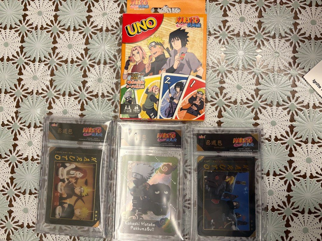 Naruto set (Category: Art & Prints) located in Singapore. Submitted by thriftz (Listing ID 1452045248, Image 1). Description: - UNO Naruto Shippuden card game - 3 x New Naruto Eaki trading card slab with plastic cover .
