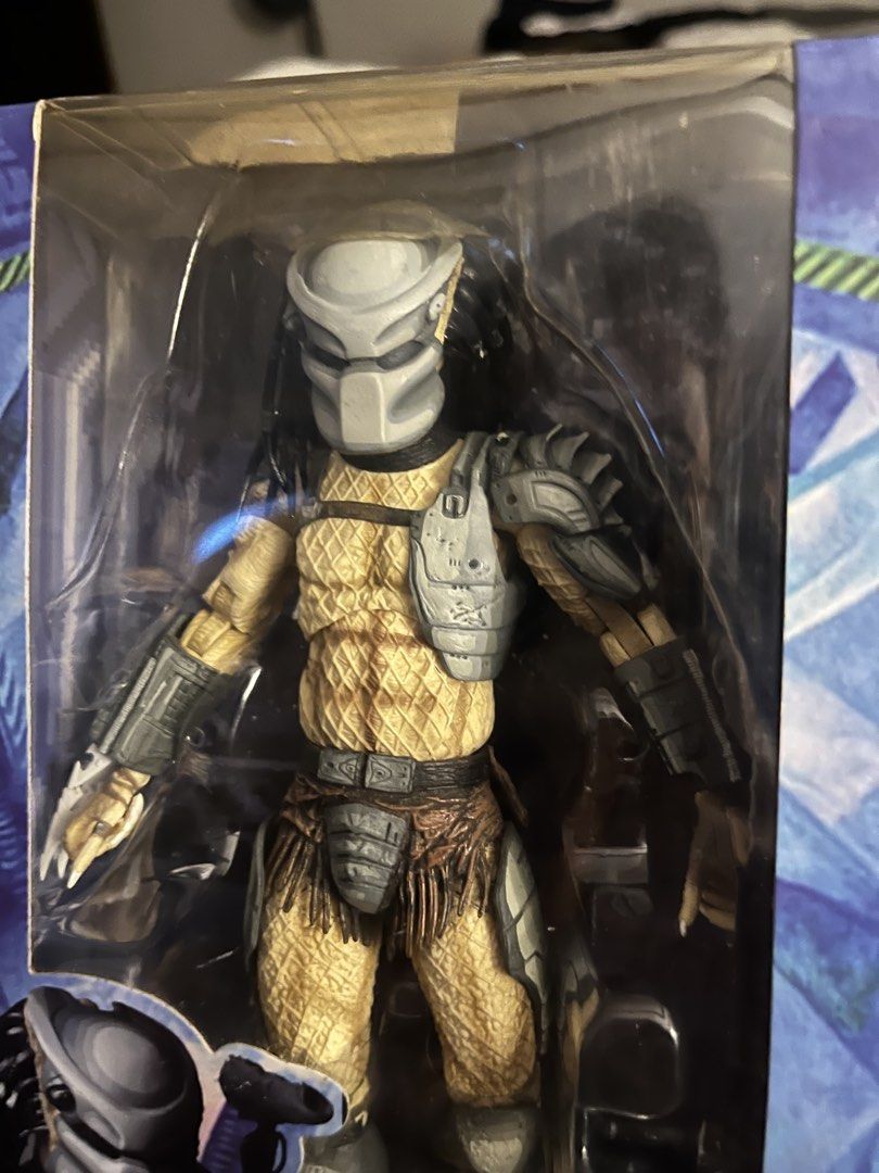 Neca Predator (Category: Figurines & Statues) located in Baguio. Submitted by jmva6 (Listing ID 1452101282, Image 2). Description: Neca Warrior Predator from the Alien versus Predstor video game BIB condition I cut out the wires from the armor as it was getting in the way of playability and articulation Figure in fine condition otherwise.