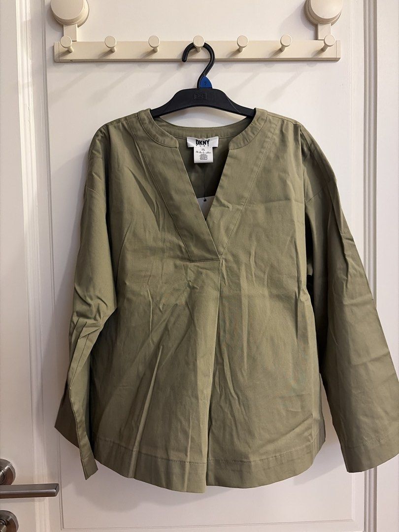NEGO DKNY Pure Olive Green V-Neck Long Sleeve Blouse (Category: Blouses) located in Kuala Lumpur. Submitted by froulee (Listing ID 1452025868, Image 1). Description: - Olive green DKNY Pure blouse - V-neckline - Relaxed fit - Long sleeves - Made in Indonesia - Original Price: RM1190.00 - Selling Price: RM150 - Ideal for casual or smart casual occasions.