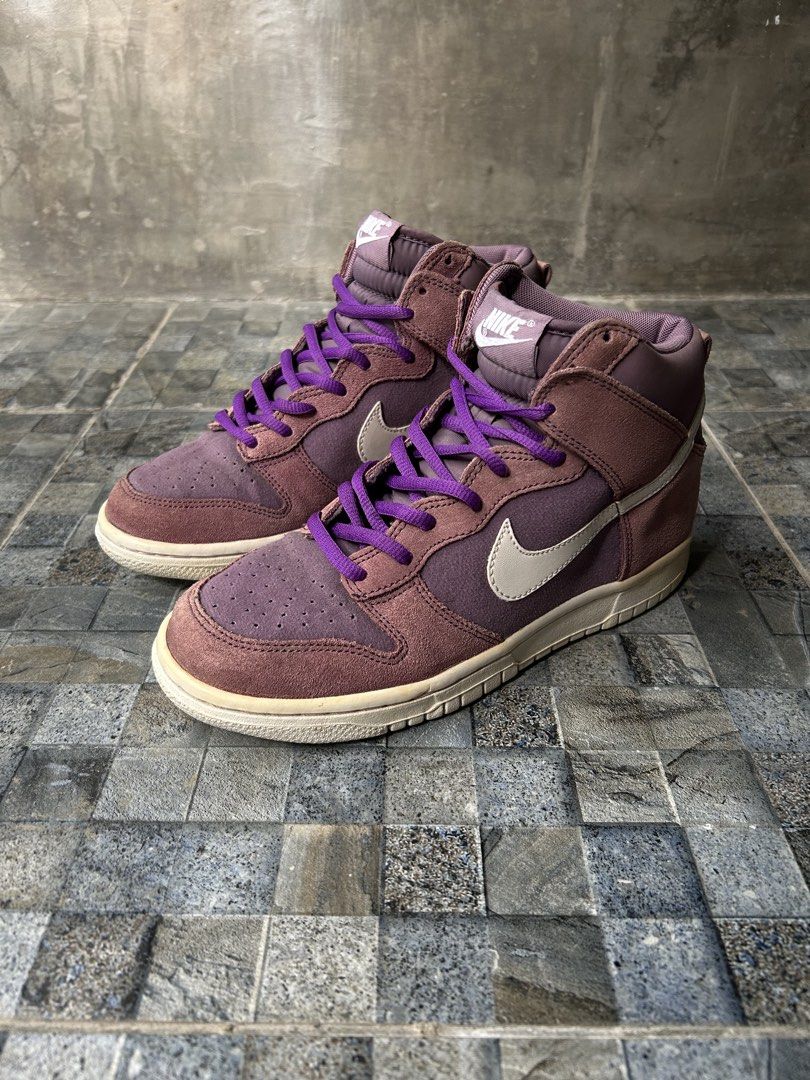 Nike Dunk High Sneakers 6.5 US W (Category: Sneakers) located in Quezon City. Submitted by commonwealthpickerph (Listing ID 1451974827, Image 2). Description: Nike Dunk High Sneakers 6.5 US W - 37.5 Euro // 23.5 CM - Eye-catching purple colorway - Premium suede accents - Vibrant purple laces - Iconic Nike swoosh on the side - Versatile for casual wear or adding flair to your outfit - In good condition - It has sign of used ( some part has yellowi