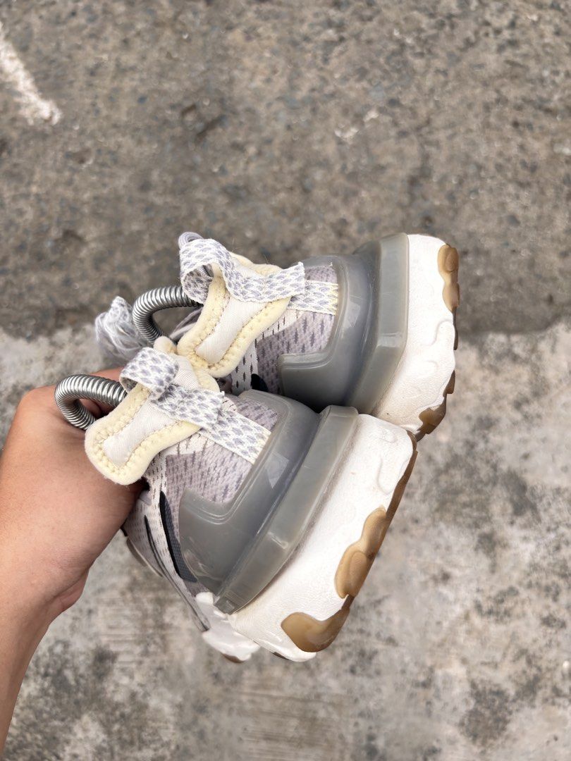 Nike React Vision "Dimension Six" CD4373-005 (Category: Sneakers) located in Manila. Submitted by kuyamosafe (Listing ID 1451922671, Image 2). Description: - Nike React Vision shoes - Dimension Six colorway - Size: US 7 (UK 6, EUR 40, CM 25) - Color: Light grey and off-white knit upper with black accents - Features: Unique layered design, React foam sole - Ideal for: Everyday wear - Condition: Please check photos for details.