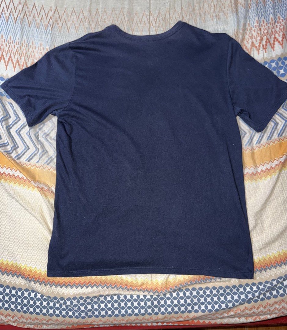 Nike Tee Dri-Fit Navy Blue (Category: Tshirts & Polo Shirts ) located in Manila. Submitted by spectral.ivot (Listing ID 1452063451, Image 3). Description: - Was a gift from the US 2 years ago. Fabric still brand new no holes, swoosh print still looks brand new. Worn it several times. Very minor discoloration on inner collar area (see 4th pic). - Size is Large on tag, but it fits a medium. Exact dimensions: Chest: 20" Length: 27" Payment first bas