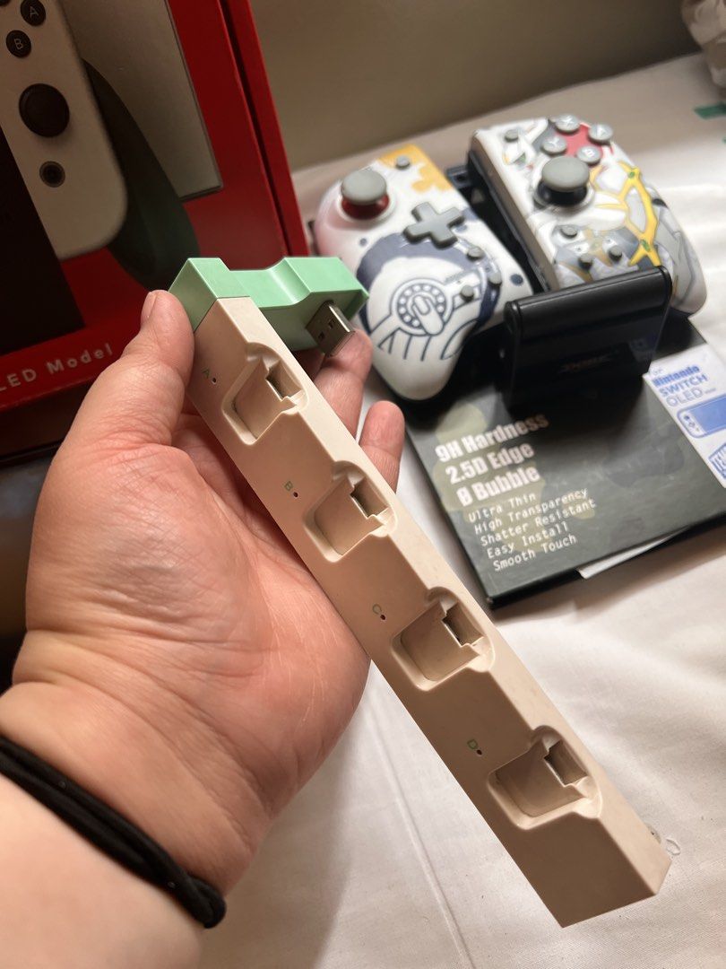 Nintendo Switch OLED Model w/ Pokemon Controllers & Games (Category: Nintendo) located in Manila. Submitted by miyusaionji (Listing ID 1451991679, Image 2). Description: 🎮 FOR SALE: Nintendo Switch OLED Selling my Nintendo Switch OLED 📦 Box Includes: ✅ Joy-Con Wrist Straps ✅ Nintendo Switch Dock ✅ HDMI Cable ✅ AC Adapter ✅ Original Box ❌ Digital Games not included ❌ Original white Joy-Cons are no longer available. ⚠️ Issue: Pink Joy-Con also wo