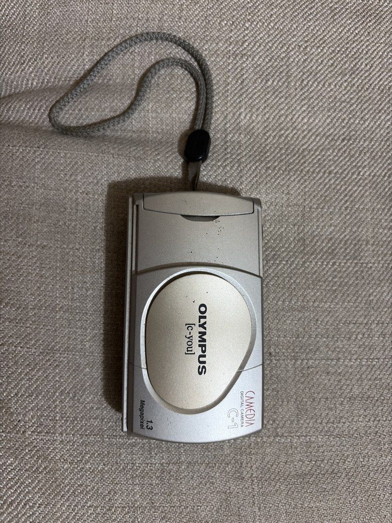 Olympus CAMEDIA C-1 Digital Camera 1.3 Megapixel (Category: Cameras) located in Muntinlupa City. Submitted by kkyamm (Listing ID 1452086689, Image 1). Description: NOT TESTED. BUY AT YOUR OWN RISK. NOT WORKING - Olympus CAMEDIA C-1 Digital Camera - 1.3 Megapixel Resolution - Includes Wrist Strap - Compact and Portable - Ideal for Casual and Retro Photography.