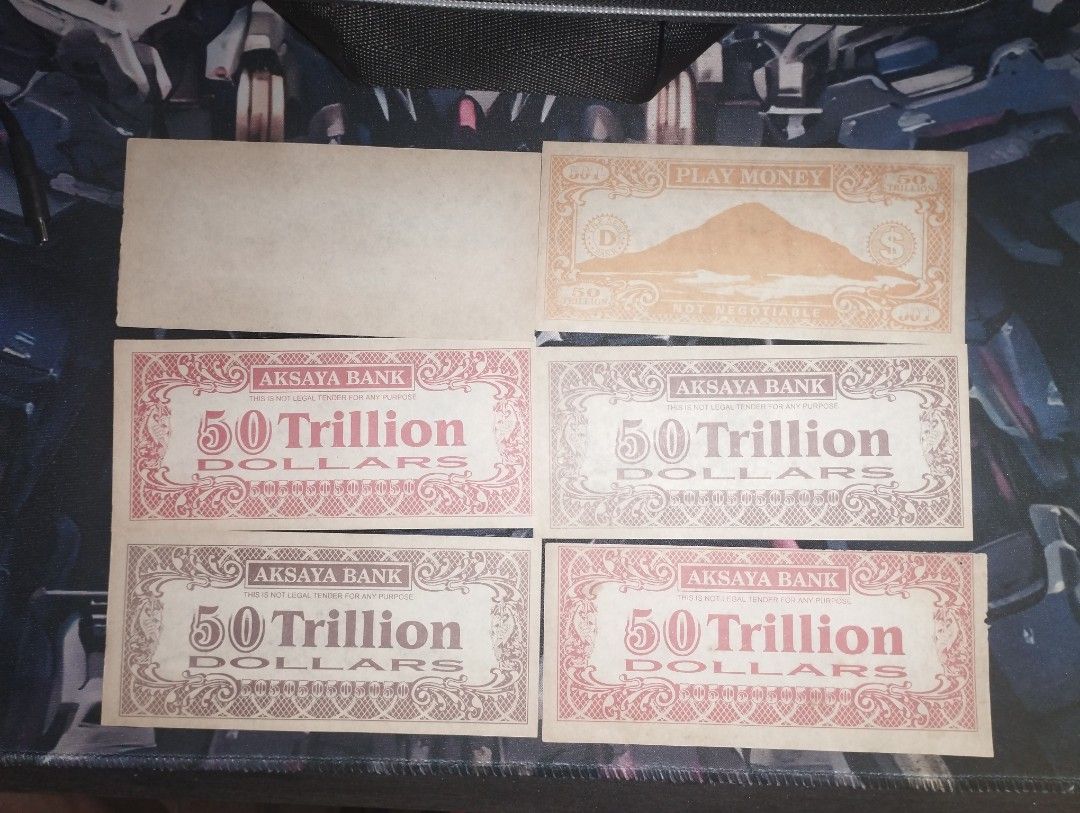 Phillippine Vintage Play Money (Category: Currency) located in Baguio. Submitted by maximum_carnage (Listing ID 1451939895, Image 2). Description: - Aksaya Bank 50 Trillion Dollar play money notes - Available in orange/pink and brown/pink color variations - Clearly marked 'Play Money' and 'Not Negotiable' - Ideal for collectors or as a unique novelty item - Selling the entire lot together.