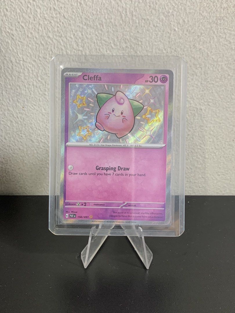 Pokemon - Paldean Fates - Shiny Cleffa (Category: Raw Singles) located in Manila. Submitted by theorbitden (Listing ID 1451996638, Image 1). Description: Pokemon - Paldean Fates Shiny Cleffa Price: 650 Condition: NM MOP: Gcash, Maribank MOD: Lalamove.