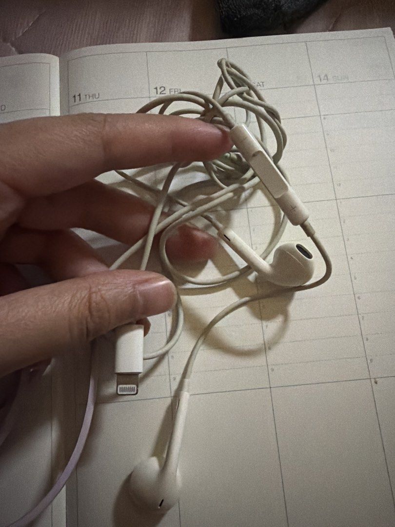 Popmart USB lightning cable (Mayor) (Category: Chargers & Cables) located in Pasig City. Submitted by abbaepreloved (Listing ID 1452006750, Image 2). Description: - Free lightning apple earphones (original but heavily used) - Cute character design iPhone charger cable - White Apple earphones with Lightning connector - Compatible with Apple devices - Ideal for everyday use - Makes a great gift idea.