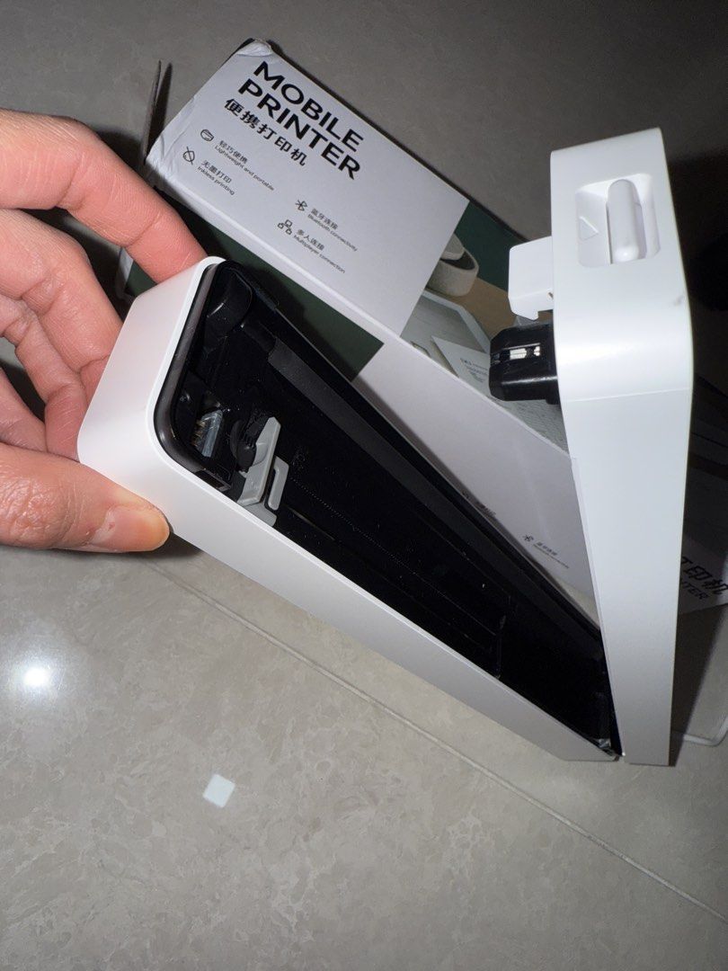 Portable Mobile Printer - Thermal wireless printer (Category: Printers, Scanners & Copiers) located in Singapore. Submitted by _axolotl (Listing ID 1452048607, Image 2). Description: - Compact and portable for printing on the go - Thermal wireless printing - Simple USB-C connectivity - User-friendly operation - Includes original box - Perfect for mobile printing needs Bought New. Used twice only, once for testing. Letting go as it doesn’t fit my 