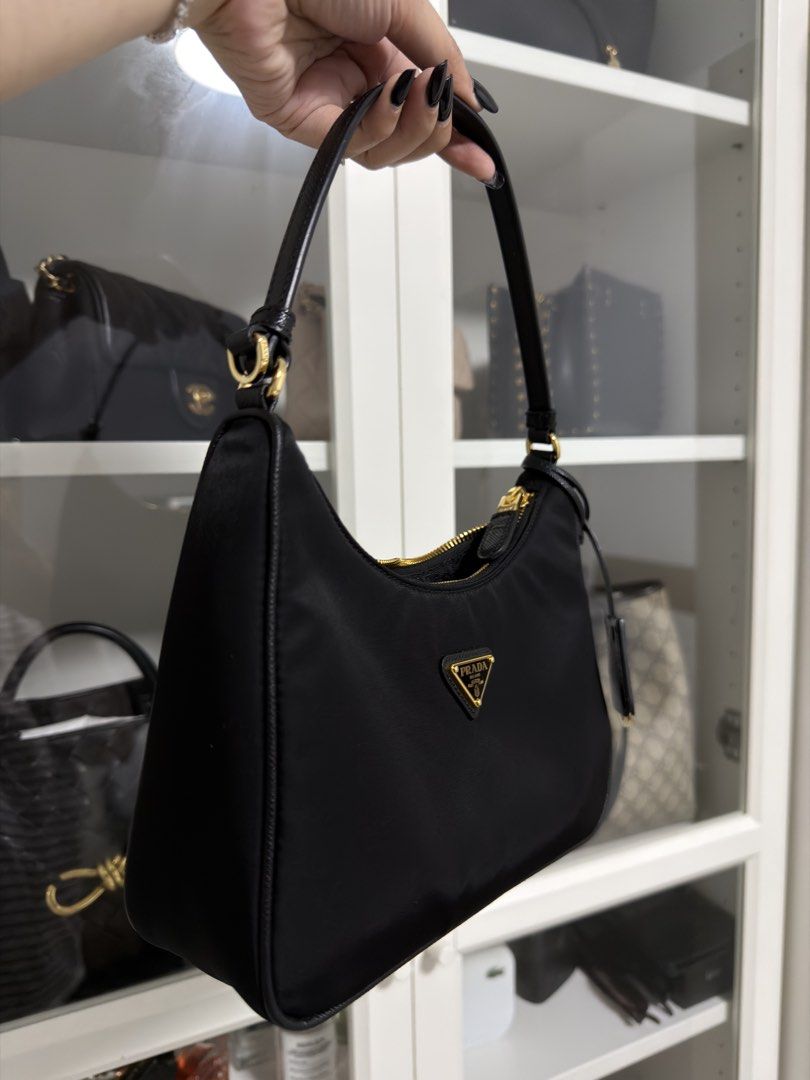 Prada Re-Edition 2005 Nylon Shoulder Bag Black (Category: Luxury Bags & Wallets) located in Manila. Submitted by marj_yyy (Listing ID 1452025011, Image 3). Description: - Authentic from Prada Greenbelt - With receipt - Complete with box, dust bag, and paper bag - RFS: wants to buy a new bag 😂 - Rarely used .