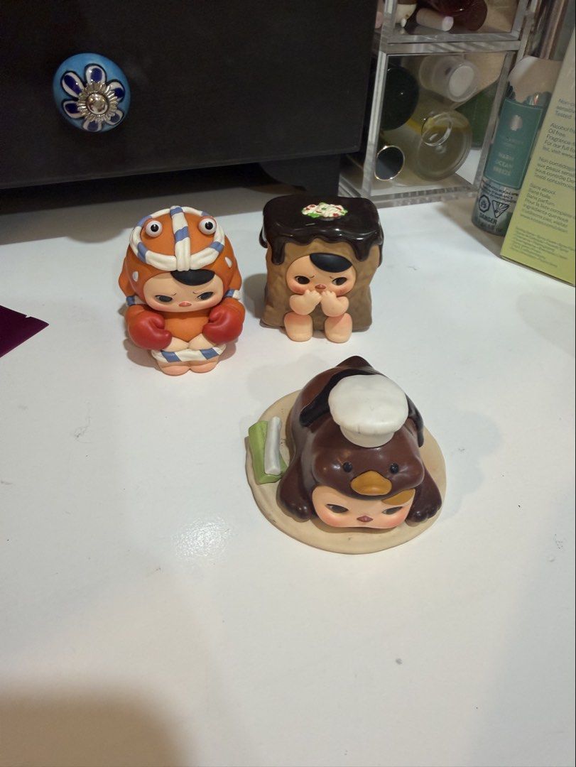 PUCKY THE FEAST (Category: Designer & Blind Box Toys) located in Makati City. Submitted by _saleph_ (Listing ID 1451996748, Image 1). Description: - Set of 4 cute blind box figurines - Food-themed characters (e.g., toast, cow, sheep, penguin) - Ideal for collectors or as a desk decoration.