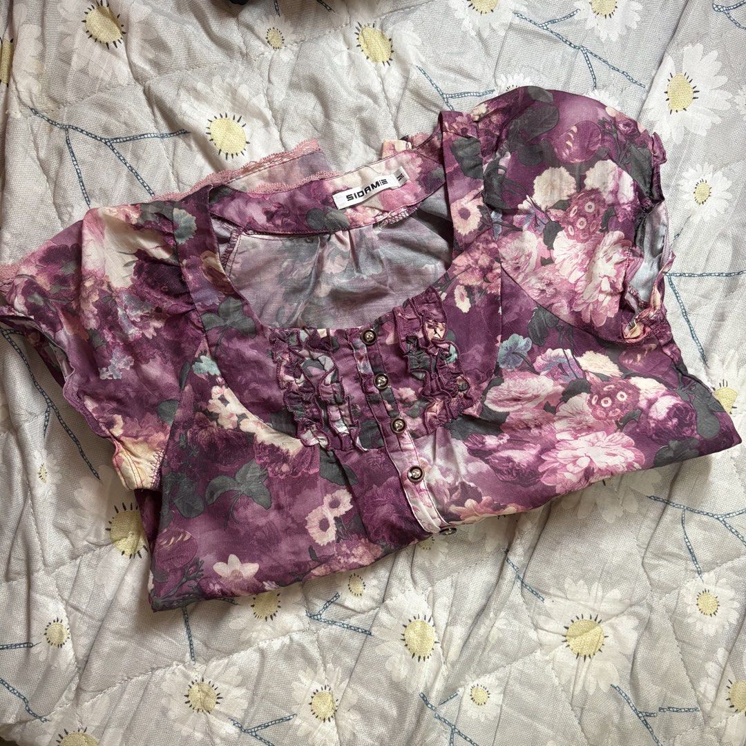 Purple Flower Top (Category: Blouses) located in Quezon City. Submitted by cheeksnihan (Listing ID 1452004812, Image 1). Description: size: medium it’s slightly see through used for a few times lang.