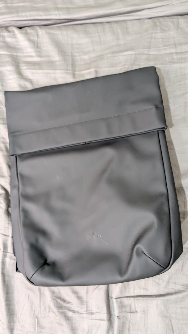Backpack Black Waterproof Roll-Top (Category: Backpacks) located in Makati City. Submitted by _mandalafinds (Listing ID 1451954653, Image 1). Description: - Black Rains backpack - Roll-top closure with zip - Waterproof material - Padded shoulder straps for comfort - Fits a laptop - Simple, clean, and minimalist design - Perfect for daily use or travel.