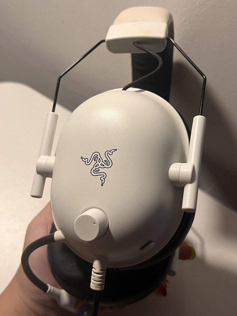 Razer Blackshark V2 X White Gaming Headset (Category: Headphones & Headsets) located in Makati City. Submitted by belladonna.ph_ (Listing ID 1452054970, Image 3). Description: Razer Blackshark V2 X White Gaming Headset. Built-in mic. White with black earcups. Some headband wear. Clean earcups. ⭐️⭐️⭐️⭐️⭐️ Has port connectors for PC headphone ports. .