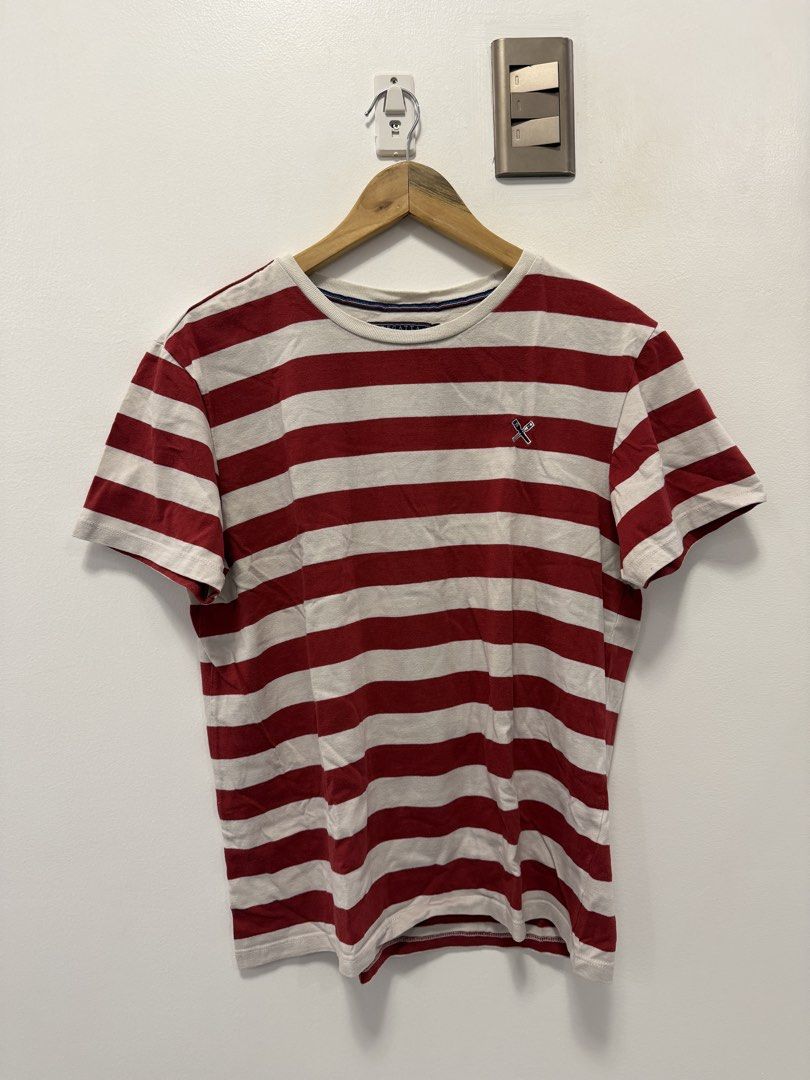 REGATTA Red & Off-White Striped Crewneck Tee (L) (Category: Tshirts & Polo Shirts ) located in Taguig. Submitted by chrisern35 (Listing ID 1452046287, Image 1). Description: Classic crimson red and off-white horizontal striped short-sleeve shirt from Regatta. Features the iconic embroidered crossed-oars logo on the chest. Great casual piece for preppy, nautical, or relaxed everyday outfits. Brand: REGATTA Size: Tagged Large (L) Color: Red / Off-W