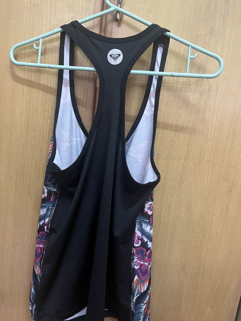 Roxy Black Floral Racerback Tank Top Size S (Category: Sleeveless) located in Manila. Submitted by cccuyyy (Listing ID 1451949807, Image 3). Description: - Roxy tank top - Black base with vibrant floral print on sides - Racerback design - Made in Sri Lanka - Size S - Ideal for workouts or casual wear.