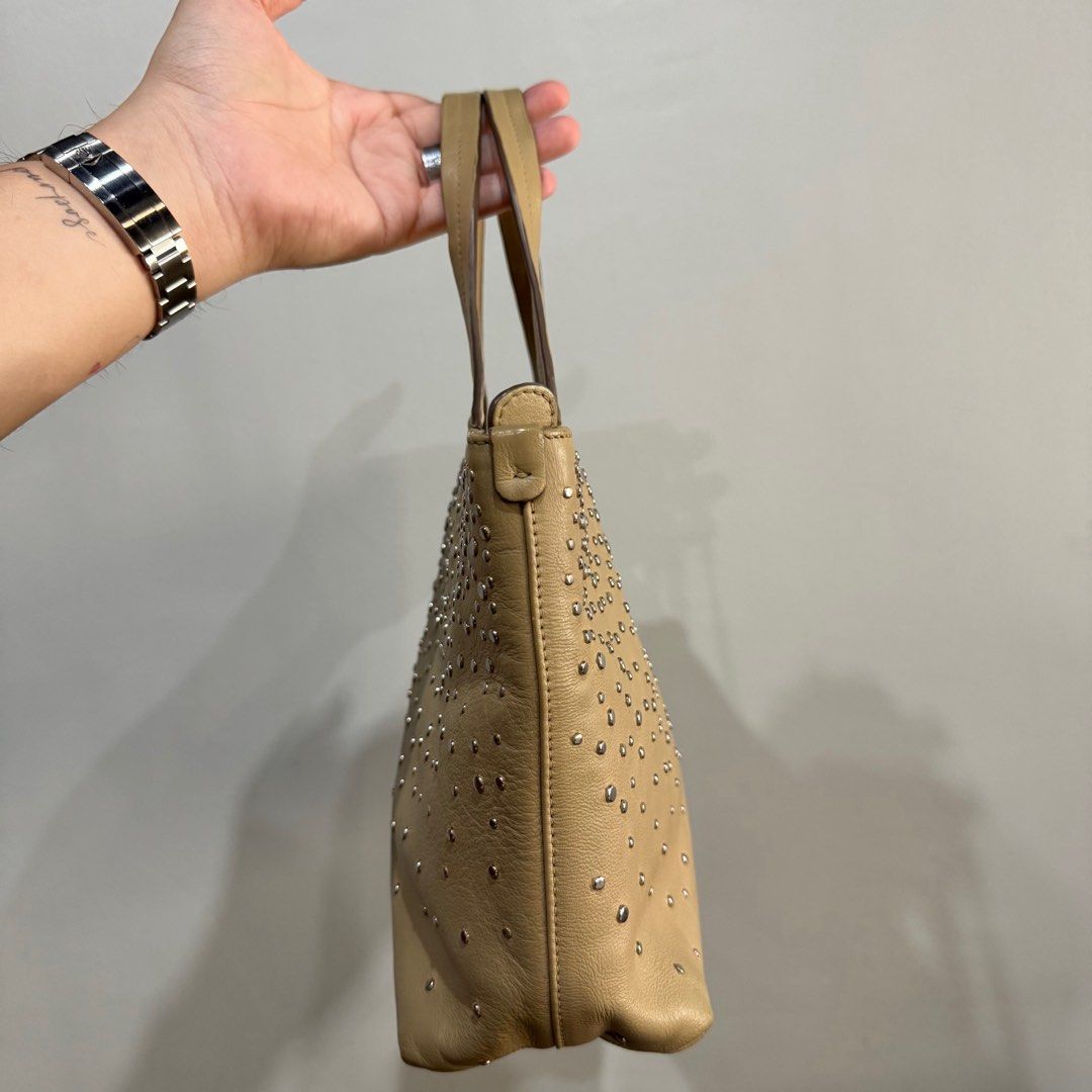 (FIXED PRICE) Salvatore Ferragamo Studed Small Tote (Category: Luxury Bags & Wallets) located in Taguig. Submitted by quirkyfindsest2020 (Listing ID 1452063137, Image 3). Description: Size same with LV Neverfull PM.