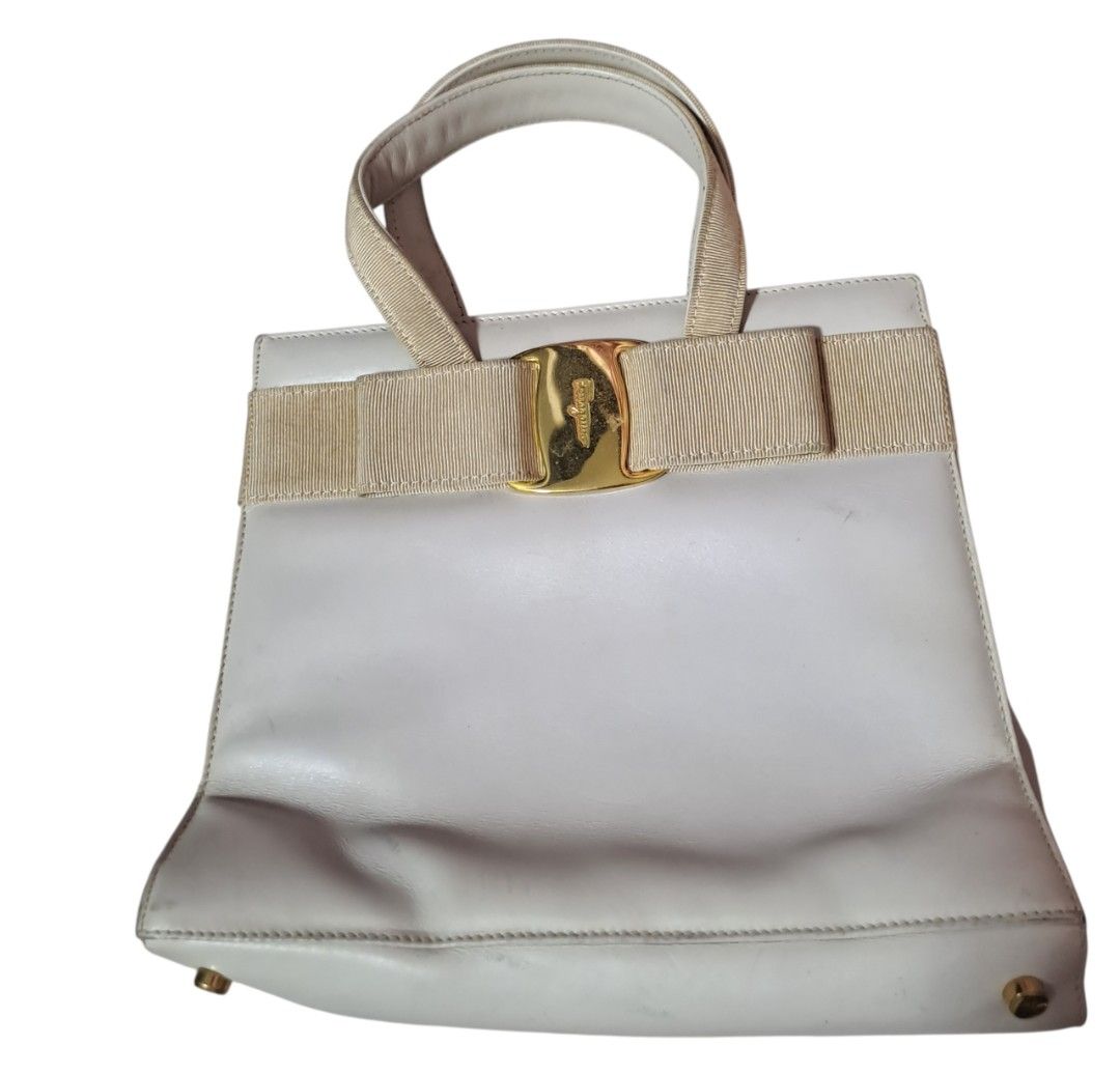 Salvatore Ferragamo white bag (Category: Luxury Bags & Wallets) located in Iloilo. Submitted by lennox_finds (Listing ID 1452049104, Image 1). Description: Salvatore Ferragamo white leather mini bag Issues can be seen in the photo Meet up, Drop off, or Pick up Mop: gcash or cash 📍iloilo city .