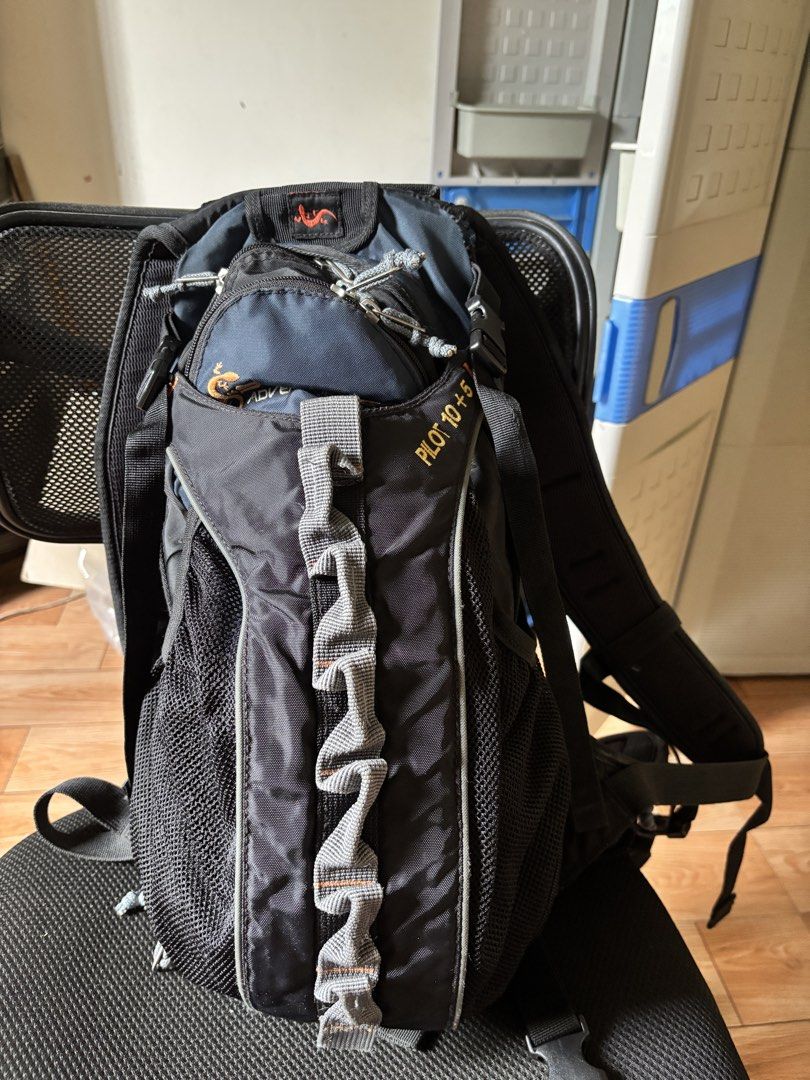 Sandugo Pilot 10+5 Adventure Backpack (Category: Hiking & Camping) located in Caloocan City. Submitted by juanmig_bundok (Listing ID 1451963508, Image 1). Description: - Sandugo Pilot 10+5 Adventure Backpack - Color: Black with blue accents - Features: Multiple pockets and mesh compartments - Comfort: Adjustable straps and padded back - Ventilation: Aerovent system on back panel - Ideal for: Hiking and day trips.