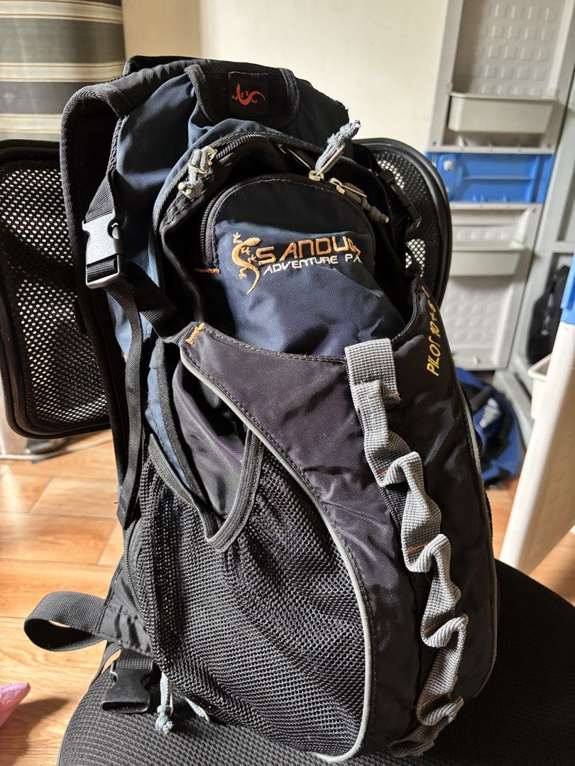 Sandugo Pilot 10+5 Adventure Backpack (Category: Hiking & Camping) located in Caloocan City. Submitted by juanmig_bundok (Listing ID 1451963508, Image 3). Description: - Sandugo Pilot 10+5 Adventure Backpack - Color: Black with blue accents - Features: Multiple pockets and mesh compartments - Comfort: Adjustable straps and padded back - Ventilation: Aerovent system on back panel - Ideal for: Hiking and day trips.