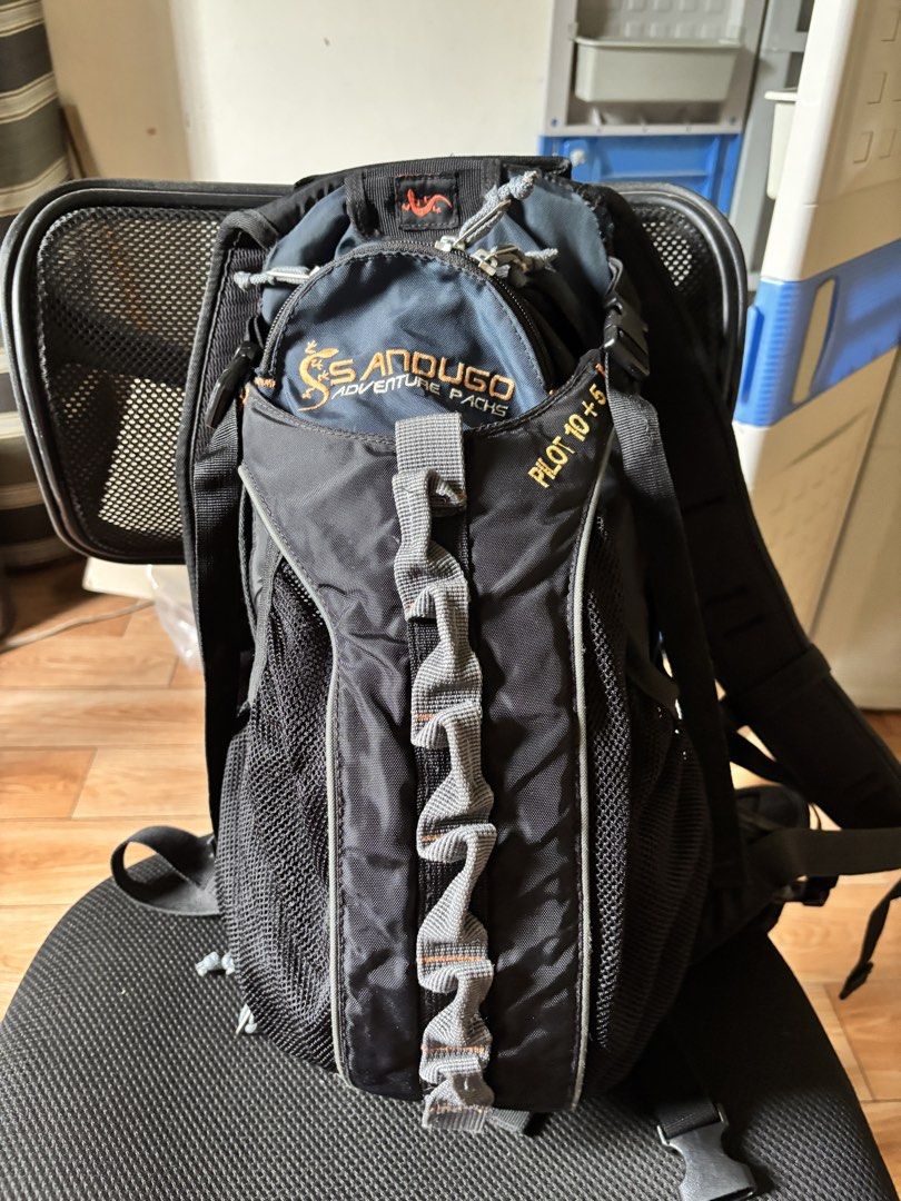 Sandugo Pilot 10+5 Adventure Backpack (Category: Hiking & Camping) located in Caloocan City. Submitted by juanmig_bundok (Listing ID 1451963508, Image 2). Description: - Sandugo Pilot 10+5 Adventure Backpack - Color: Black with blue accents - Features: Multiple pockets and mesh compartments - Comfort: Adjustable straps and padded back - Ventilation: Aerovent system on back panel - Ideal for: Hiking and day trips.