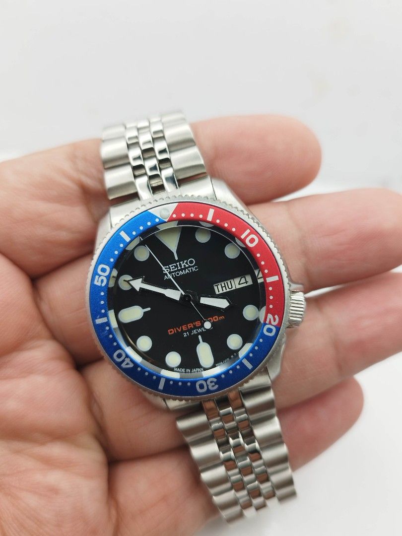 Seiko divers pepsi (Category: Men's Watches) located in Quezon City. Submitted by WatchProject (Listing ID 1451974112, Image 2). Description: This watch is mod original Seiko 7s26 movement newly overhauled and oiled movement Sapphire glass 37mm case dm in good running condition titanium bezel aftermarket base dial hands strap with box and paper bag.