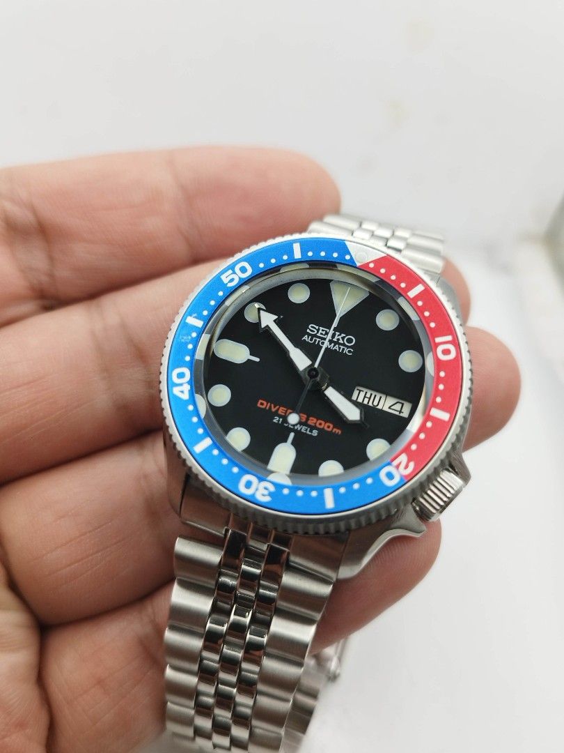 Seiko divers pepsi (Category: Men's Watches) located in Quezon City. Submitted by WatchProject (Listing ID 1451974112, Image 3). Description: This watch is mod original Seiko 7s26 movement newly overhauled and oiled movement Sapphire glass 37mm case dm in good running condition titanium bezel aftermarket base dial hands strap with box and paper bag.