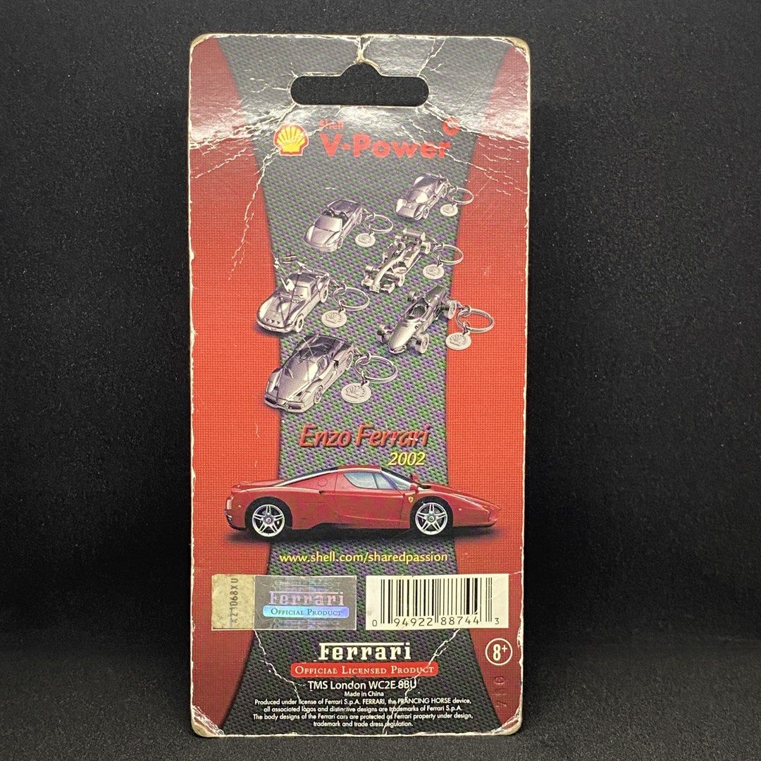 Shell V-Power Enzo Ferrari Keychain (Category: Vehicle & Diecast Models) located in Cainta. Submitted by barangaydrip (Listing ID 1452036945, Image 2). Description: - Silver-colored keychain featuring a Ferrari car - Part of the exclusive Shell V-Power Enzo Ferrari collection - Includes original packaging - Comes with a timeline of Ferrari milestones - Ideal collectible for car enthusiasts and Ferrari fans.