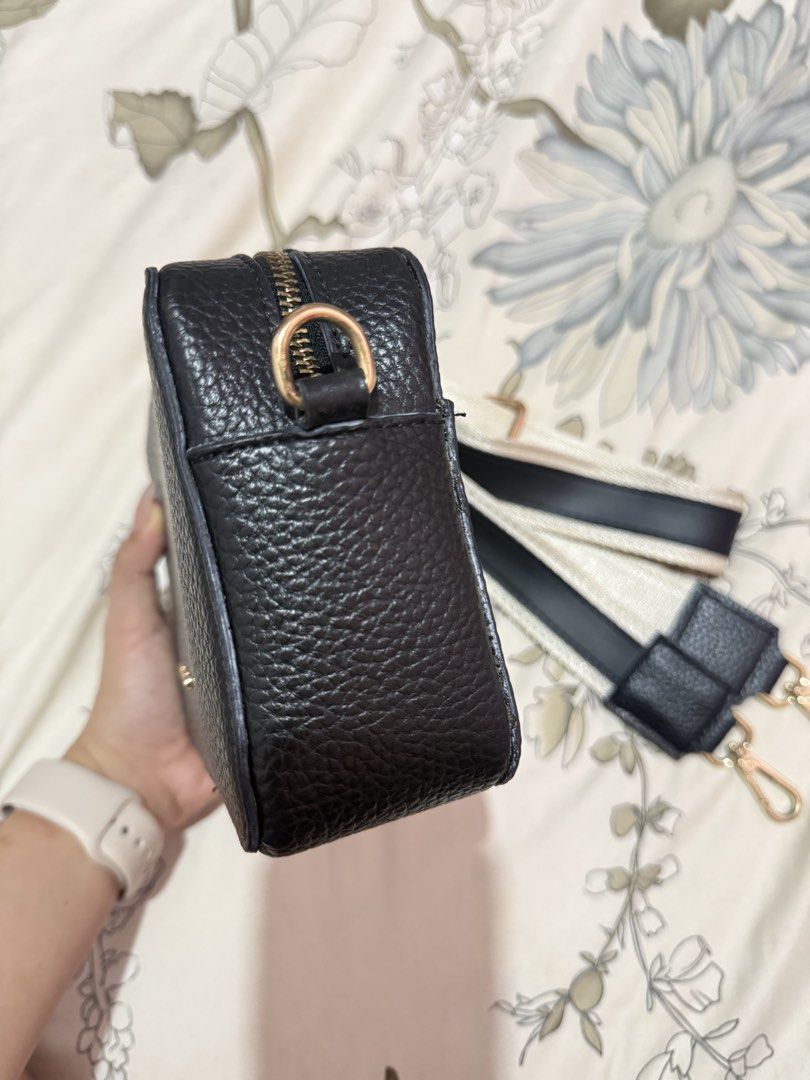 Sling bag (Category: Sling Bags) located in Taguig. Submitted by chen.preloveddd (Listing ID 1451959212, Image 3). Description: - Used once gift from Switzerland - With minimal white discoloration but not so obvious naman pls check the pics for details Rfs: Need some spacw for my bag closet 📍 Taguig south signal village.