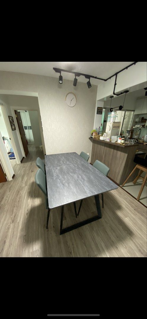 Solid dining table extendable with chairs (Category: Tables & Sets) located in Singapore. Submitted by mada18 (Listing ID 1451947042, Image 1). Description: Solid Dining table with 4 chairs Can extend up to 2.1m Price with delivery Price negotiable .