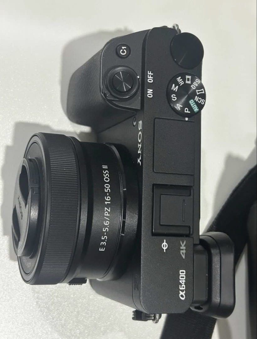 Sony Alpha a6400 Mirrorless Camera with 16-50mm Lens (Category: Cameras) located in Quezon City. Submitted by onceakidqc (Listing ID 1452105248, Image 2). Description: Sony Alpha a6400 camera. Comes with kitlens. Also includes the original bag. Purchased last April 2025 from Henry’s (Total of 60kish) ... Good as new. No Issues Shutter count around 3000ish Inclusions: Body + kit lens, battery, charging cables, box, and ravower extra batt. Used twi