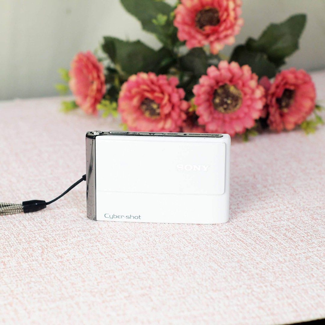 Sony CyberShot DSC-T70 (Category: Cameras) located in Paranaque City. Submitted by digicamera_zone_ph (Listing ID 1451935128, Image 2). Description: 📸Sony Cyber-shot DSC-T70 🌸 Compact, stylish, and perfect for capturing everyday memories! ✨ Key Specs: • 8.1 Megapixels Super HAD CCD sensor • Carl Zeiss Vario-Tessar lens • 3× Optical Zoom (38–114mm equivalent) • 3.0-inch Clear Photo LCD touchscreen • Super SteadyShot image stabilization • ISO 80–