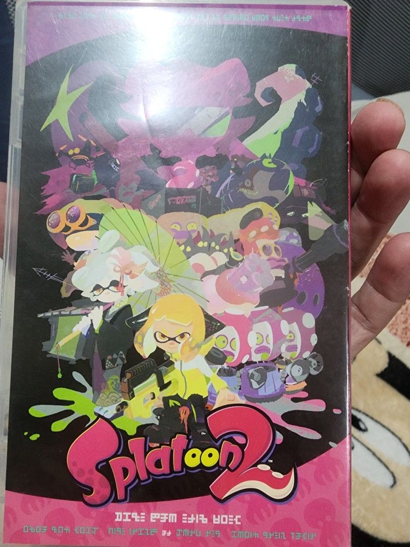 Splatoon 2 Nintendo Switch Game (Category: Nintendo) located in Caloocan City. Submitted by erreiv (Listing ID 1452103342, Image 3). Description: - Splatoon 2 game for Nintendo Switch - Includes game cartridge and case - Vibrant case artwork featuring characters - Great for fans of the Splatoon series.
