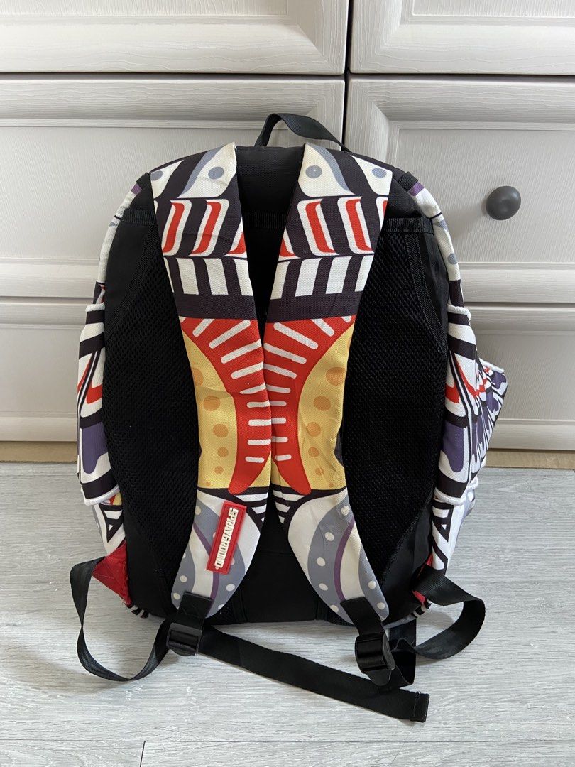 Sprayground Backpack - Tribal Eagle Shark Design (Category: Backpacks) located in Binan City. Submitted by doze16 (Listing ID 1452044092, Image 2). Description: - Unique Sprayground backpack - Features a striking tribal eagle and shark design - Distinctive wing details on the sides - Padded straps for maximum comfort - Ideal for school, travel, or everyday adventures - Clearly displays the Sprayground logo.