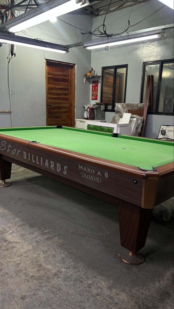 Star Billiards Maxima 8 Diamond Pool Table (Category: Billiards and Bowling) located in Manila. Submitted by jakebadenh81959 (Listing ID 1452048678, Image 2). Description: Star Billiards Maxima 8 Diamond pool table with green felt and a wooden finish. Great for game rooms. Ready for pickup!.