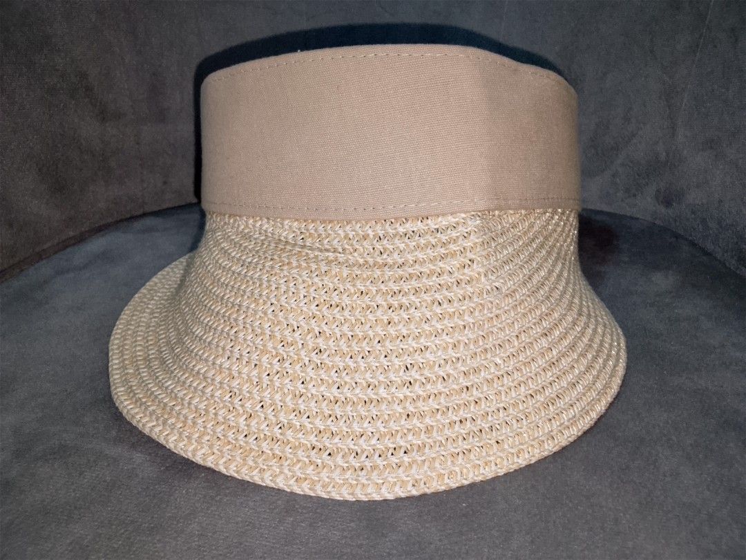 Straw Visor Hat with Tan Fabric Band (Category: Hats & Beanies) located in Binangonan. Submitted by yuristalin888 (Listing ID 1452083710, Image 3). Description: - Lightweight straw visor - Tan fabric band around the crown - Provides excellent sun protection for your face - Comfortable to wear - Easy to pack for travel - Ideal for beach days or casual outings.