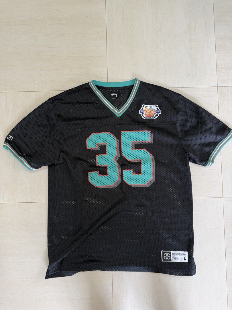 Stussy Basketball Jersey Size L Black （分類：運動服裝）位於 Hong Kong。 由 agnes.ccw 提交（商品編號 1451966043，圖片 1）。簡介： - Stussy International basketball jersey - Color: Black with teal '35' graphic - Size: L - Material: Mesh - Perfect for casual wear or sports。