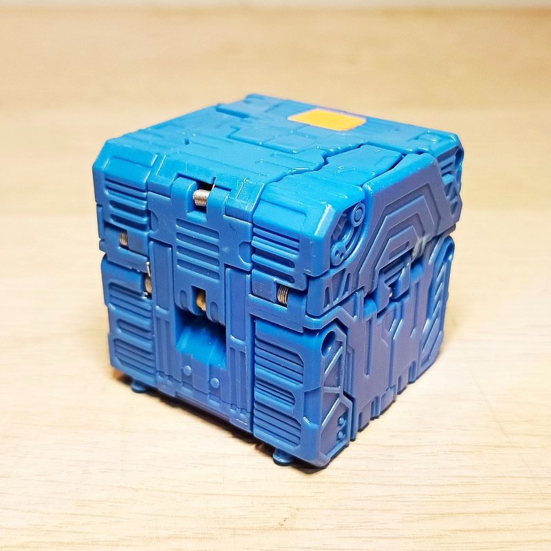 Takara Tomy Beast Saga Blue Cube Tank Transform - Cube to Battle Tank + Pilot Figure WYSIWYG (Category: Toys & Games) located in Masai. Submitted by gwentwong (Listing ID 1451970235, Image 3). Description: Takara Tomy Beast Saga - Mini Tank Vehicle Condition: USED LOOSE - WYSIWYG ✅ What You See Is What You Get - Exactly as 5 photos ✅ Photo 1-2: Cube closed mode - blue with yellow details - transforms ✅ Photo 3-5: Tank / missile launcher mode with