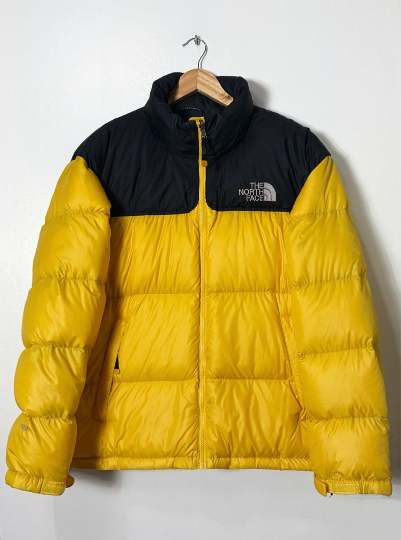 THE NORTH FACE 1996 RETRO NUPTSE 700 FILL PACKABLE JACKET (Category: Coats, Jackets and Outerwear) located in Cavite. Submitted by frankiemnla (Listing ID 1452093633, Image 1). Description: Authenticated L- 29 W- 25 Size- L to XL Excellent condition Design: Boxy, oversized retro silhouette featuring high-loft down baffles. Material: Built with the original shiny, water-repellent ripstop fabric. Details: Features a packable hood that stows into th