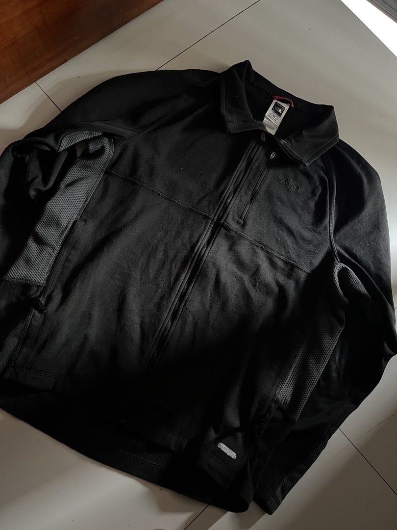 The North Face Track Jacket (Category: Coats, Jackets and Outerwear) located in Santa Ana. Submitted by rlave (Listing ID 1452003606, Image 1). Description: Preloved The North Face black full-zip jacket, size M, men’s fit. Features the embossed North Face logo on the chest, mock collar, zippered chest and side pockets, and mesh-lined side panels for breathability. Comfortable technical fit — great for outdoor use, layering, or everyday cooler-wea