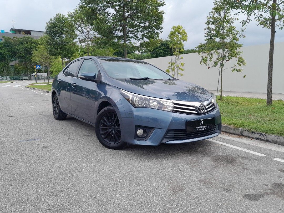 Toyota Corolla Altis 1.6A Auto (Category: Used Cars) located in Singapore. Submitted by preciseauto (Listing ID 1452028389, Image 1). Description: 🔥🔥BOSS SAY ALL MUST GO CLEARANCE SALE🔥🔥 🚨CHEAPEST CARS IN THE MARKET🚨 🚘$500 DRIVEAWAY🚘 🏦LOWEST INTEREST FROM 1.48%🏦 🟢1 YEAR WARRANTY🟢 🔧FREE 1 YEAR SERVICING🔧 🏬 Vehicle 120 Points INSPECTION CHECK By In House Workshop BEFORE we put them for SALE 🚕 PHV Drivers Welcomed 🔁 High Trade In Va